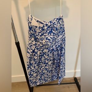 Blue and white strapless dress.